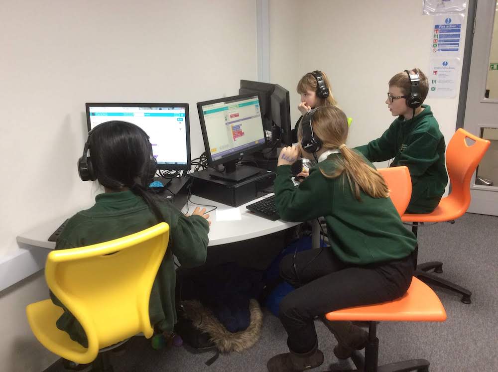 Children coding at school