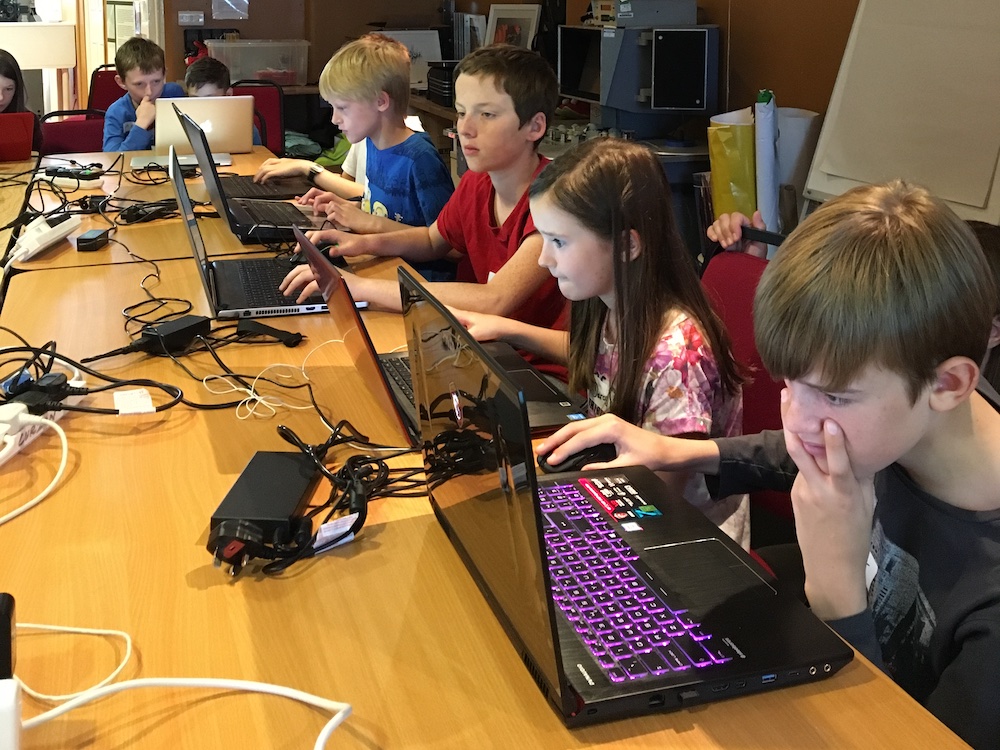 Children coding in Scratch
