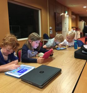 Children coding with ScratchJr