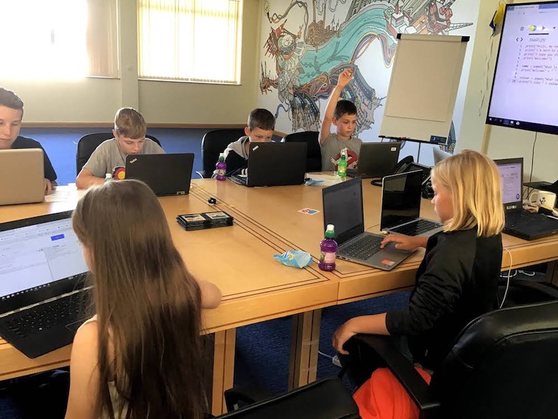 Children coding at a Summer of Code event