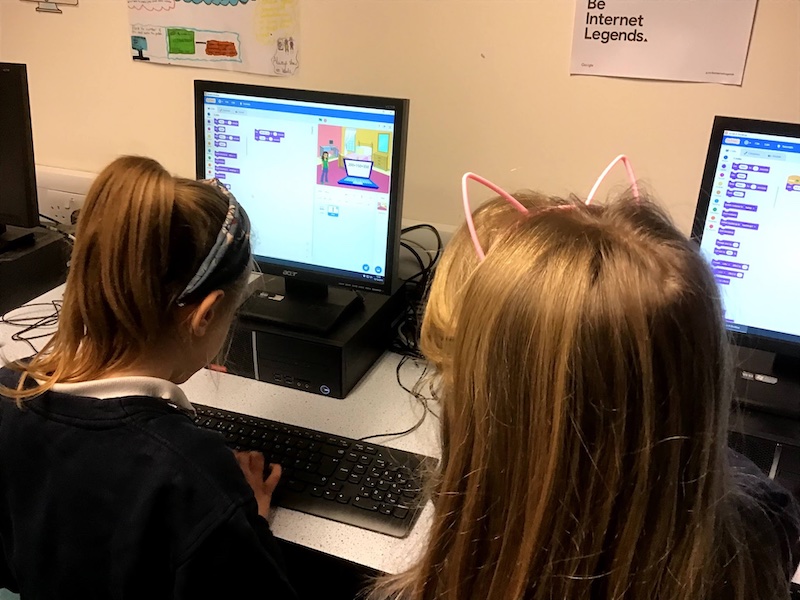 Girls coding at coding club