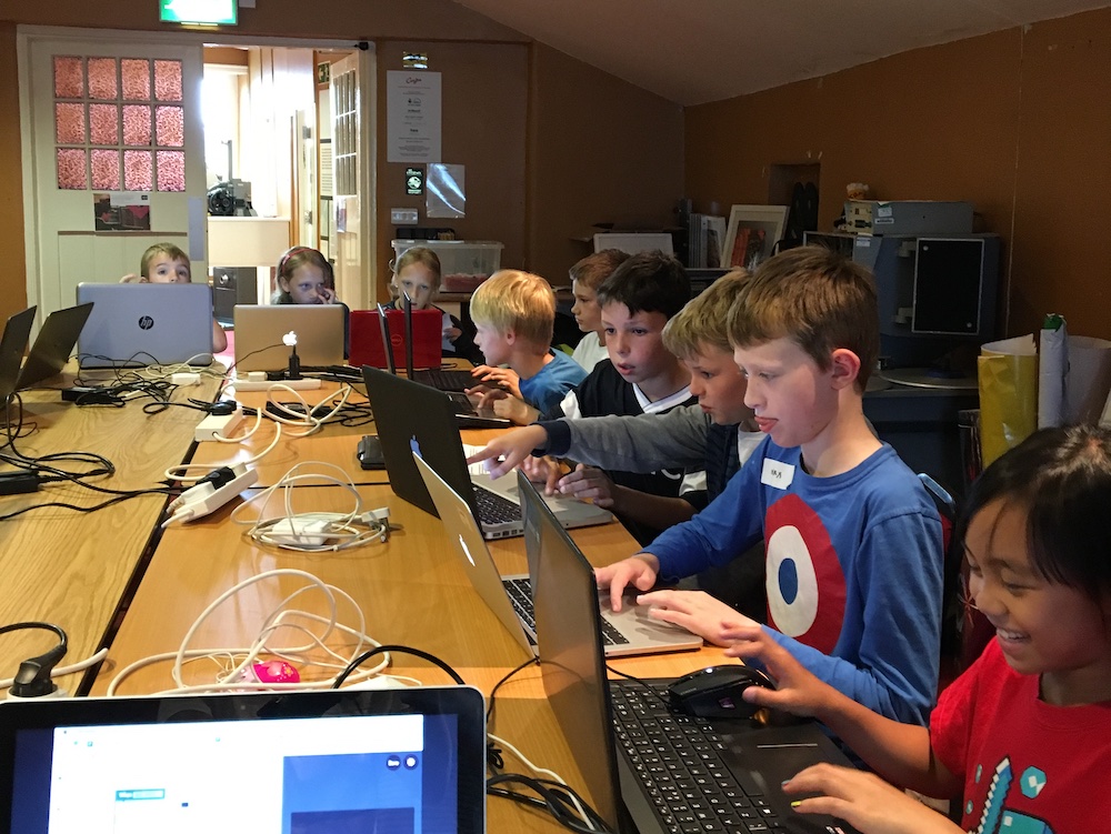 Children coding at the Summer of Code