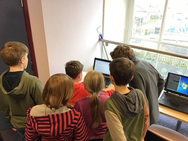 Children coding a chatbot in Python