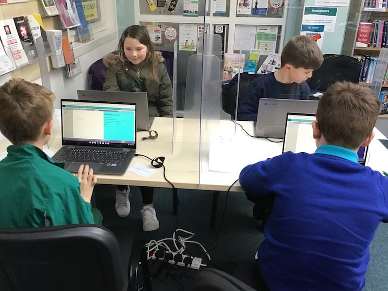 Children building a website.